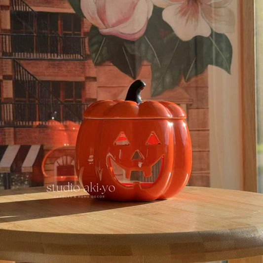 orange pumpkin wax melt burner perfect for your spooky Halloween seasonal home decor