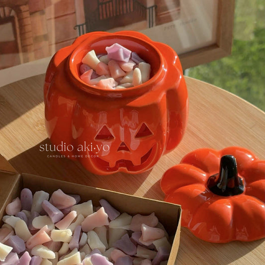 orange pumpkin wax melt burner perfect for your spooky Halloween seasonal home decor