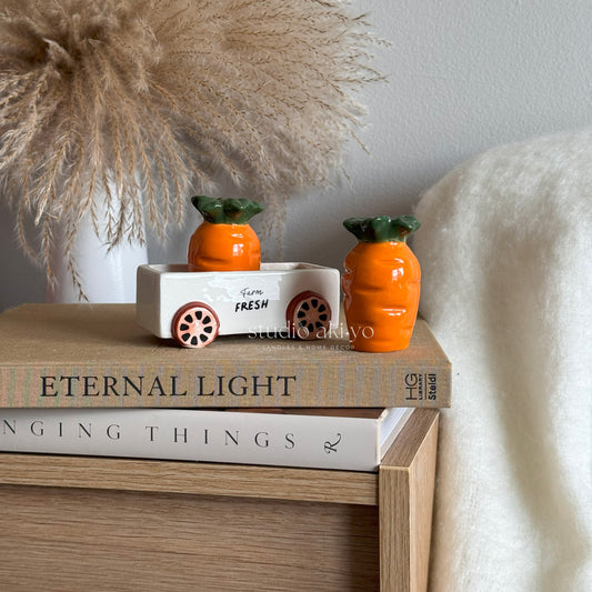 Easter table decor featuring carrot salt and pepper shaker set