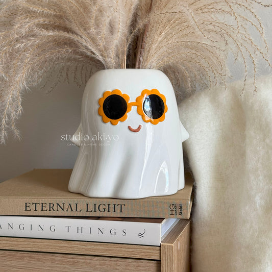 Hippie ghost Summerween vase filled with dried flowers in spooky autumn décor