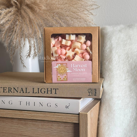 Harvest Moon wax melts scoopies in stars and moon shapes scented with bright fresh yuzu