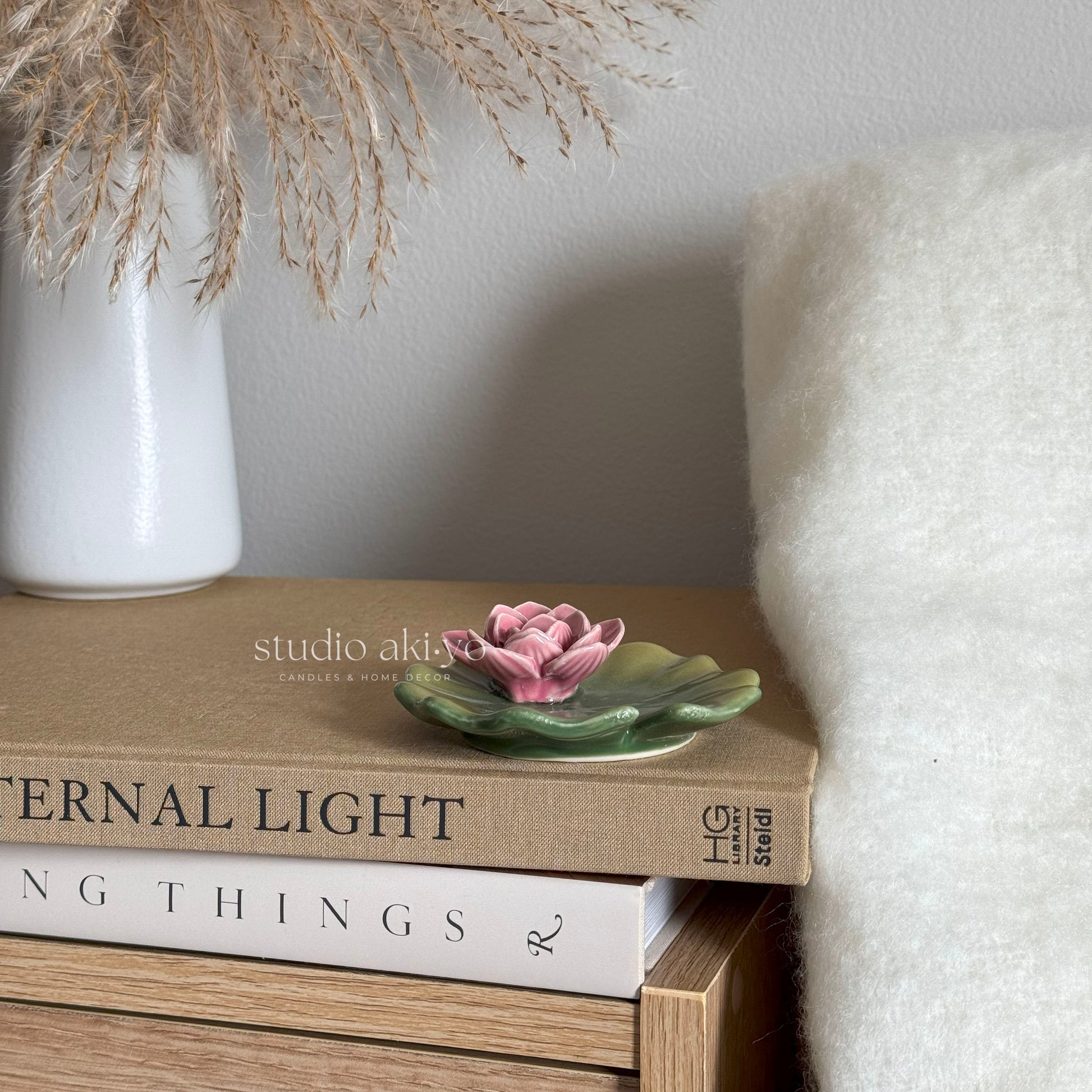 Green ceramic lily pad incense stick holder with central hole and dish