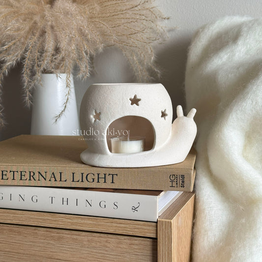 Handmade ceramic snail wax melt burner in cream speckle finish