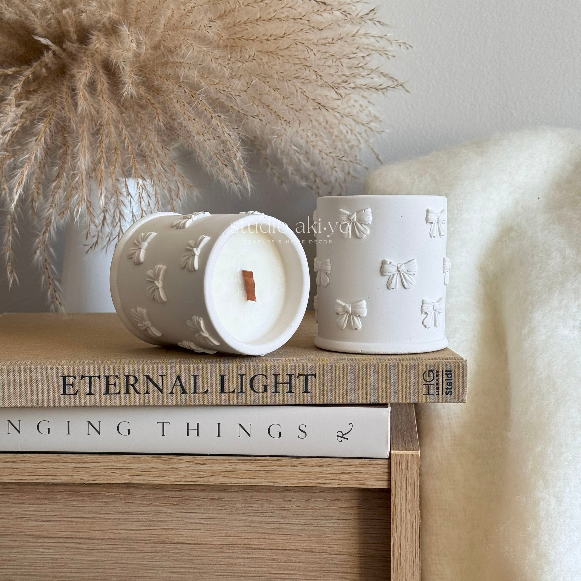 Sunflower silk wooden wick candle in neutral shade in support for breast cancer awareness