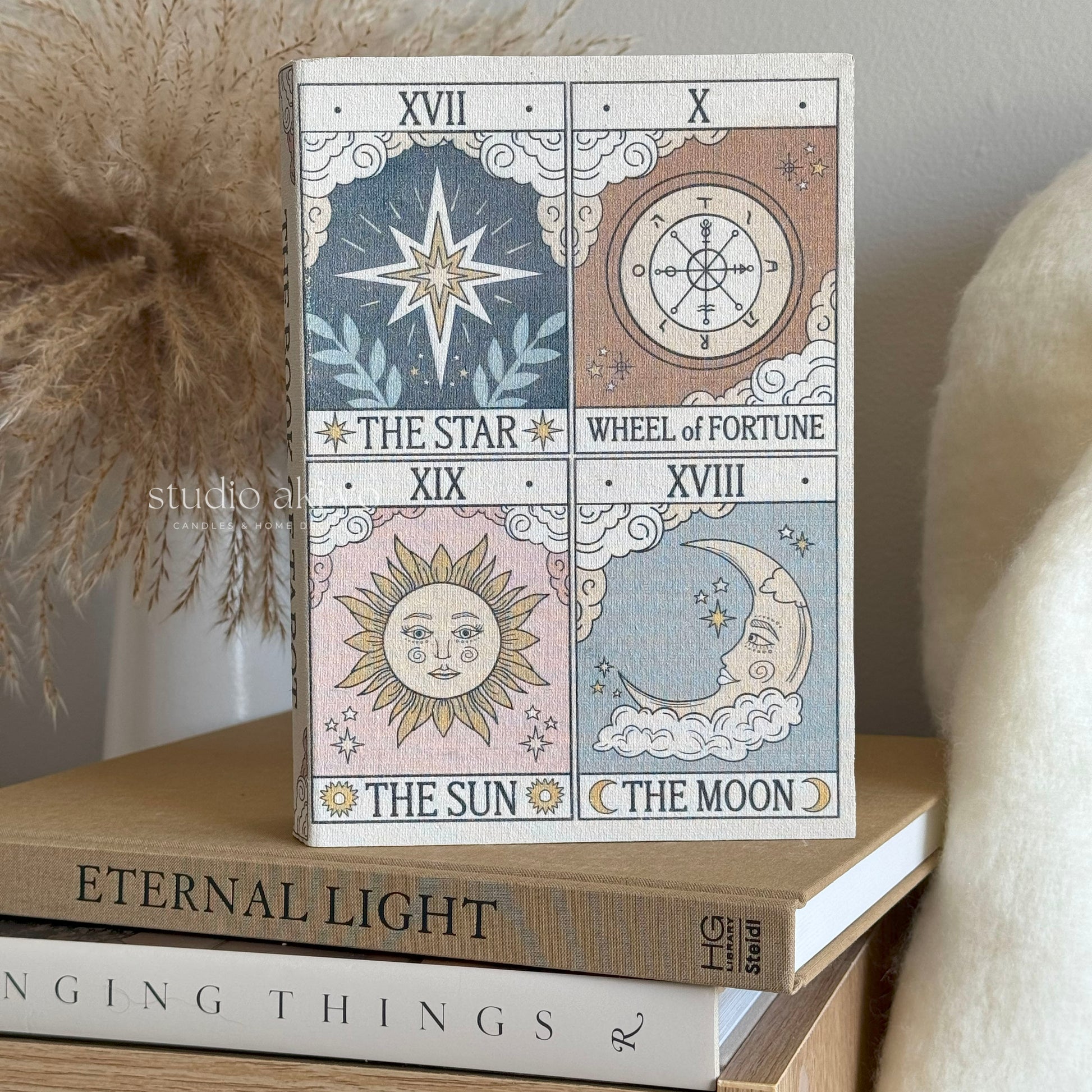 Book-shaped storage box with vintage tarot design—Sun, Moon, Star motifs