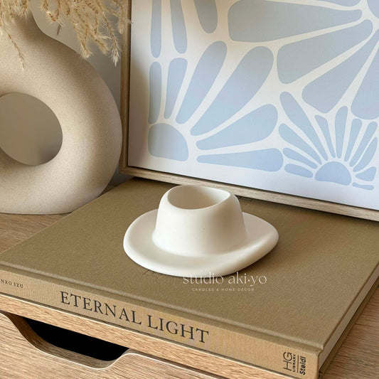 Jesmonite cowboy hat match holder on neutral aesthetic background