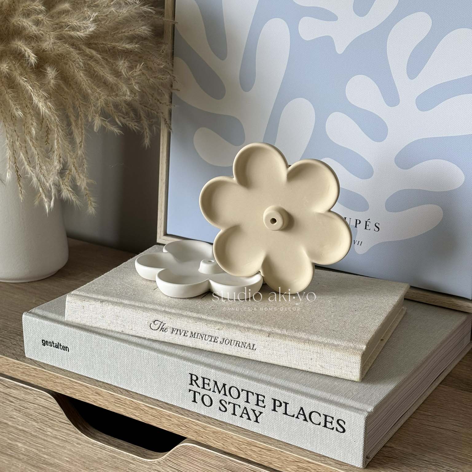 Minimalist flower incense holder styled in a serene setting