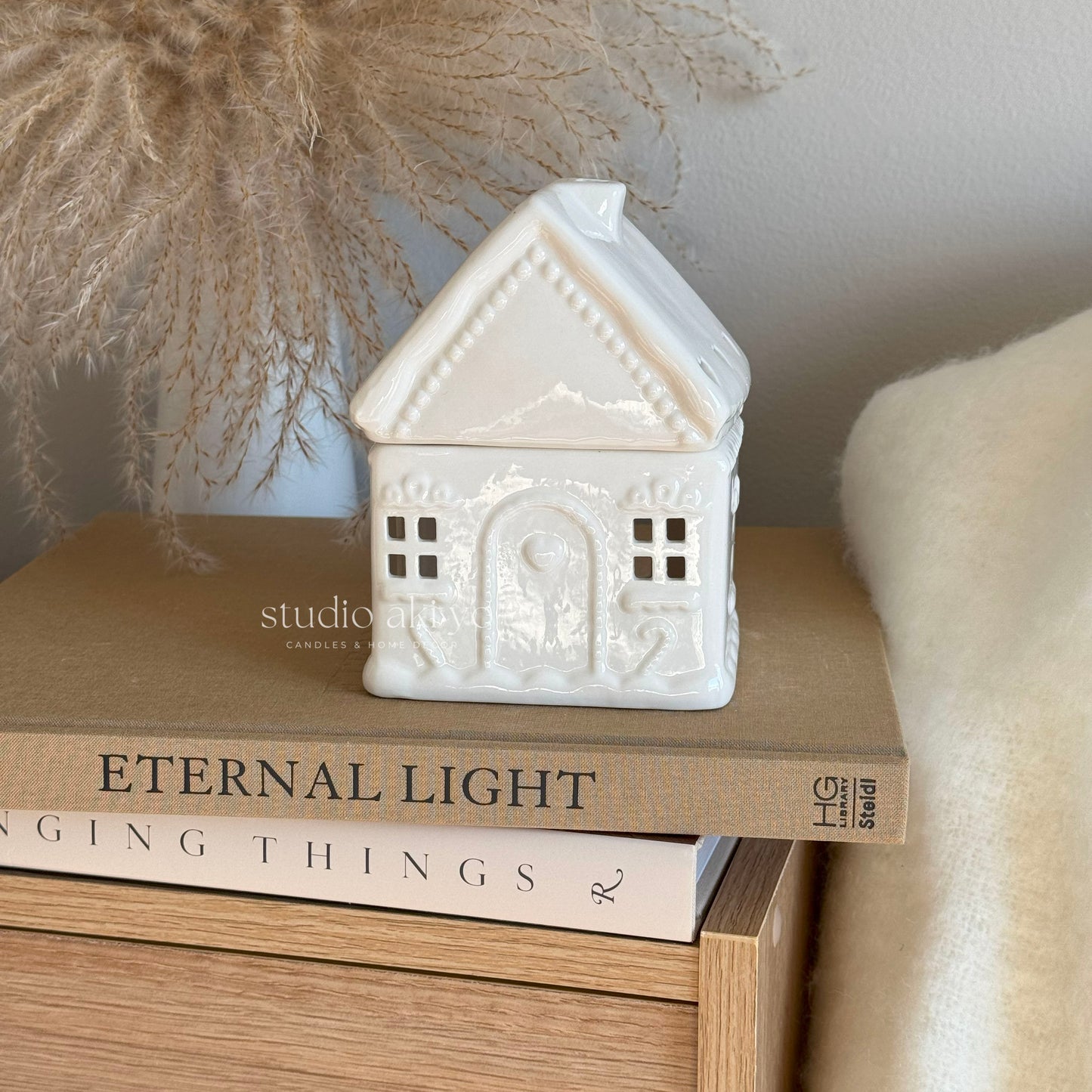 Ceramic gingerbread house wax melt burner with white icing detailing