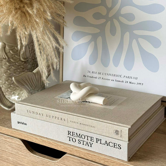 Sculptural modern candle decor with fluid organic lines