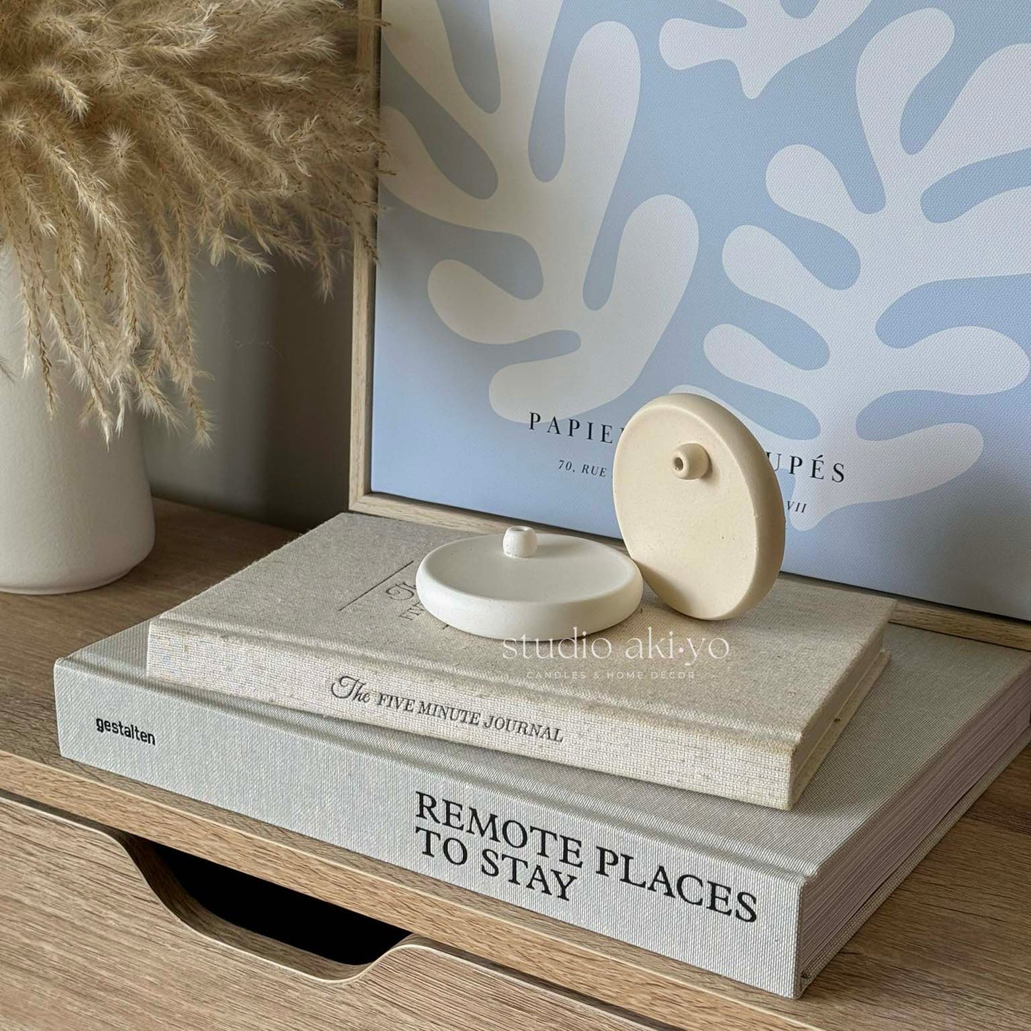 Modern minimalist incense burner styled in a calm setting