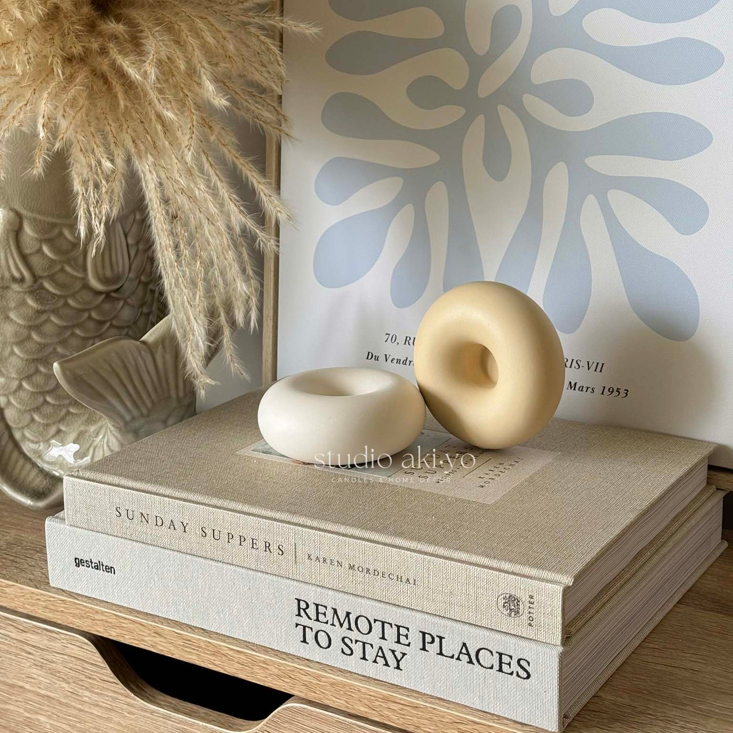 Minimalist taper candle holder made from jesmonite in neutral tone