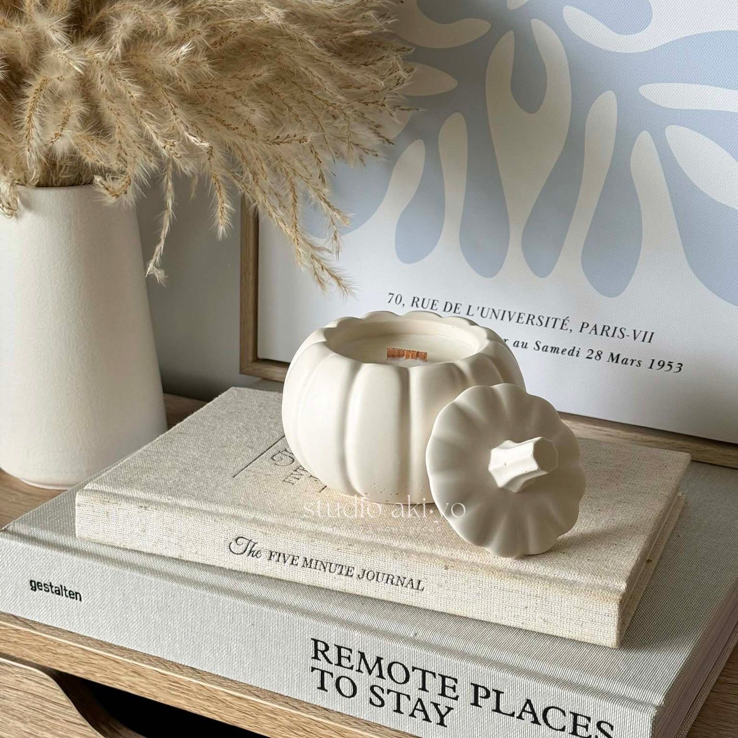 Pumpkin chai scented candle with wood wick in artisan pumpkin candle jar