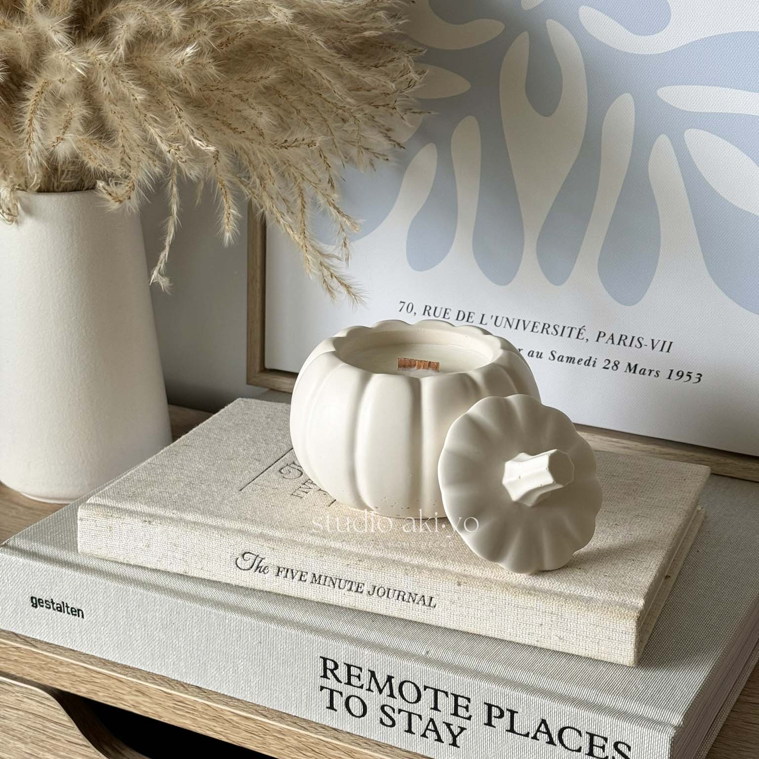 Pumpkin chai scented candle with wood wick in artisan pumpkin candle jar