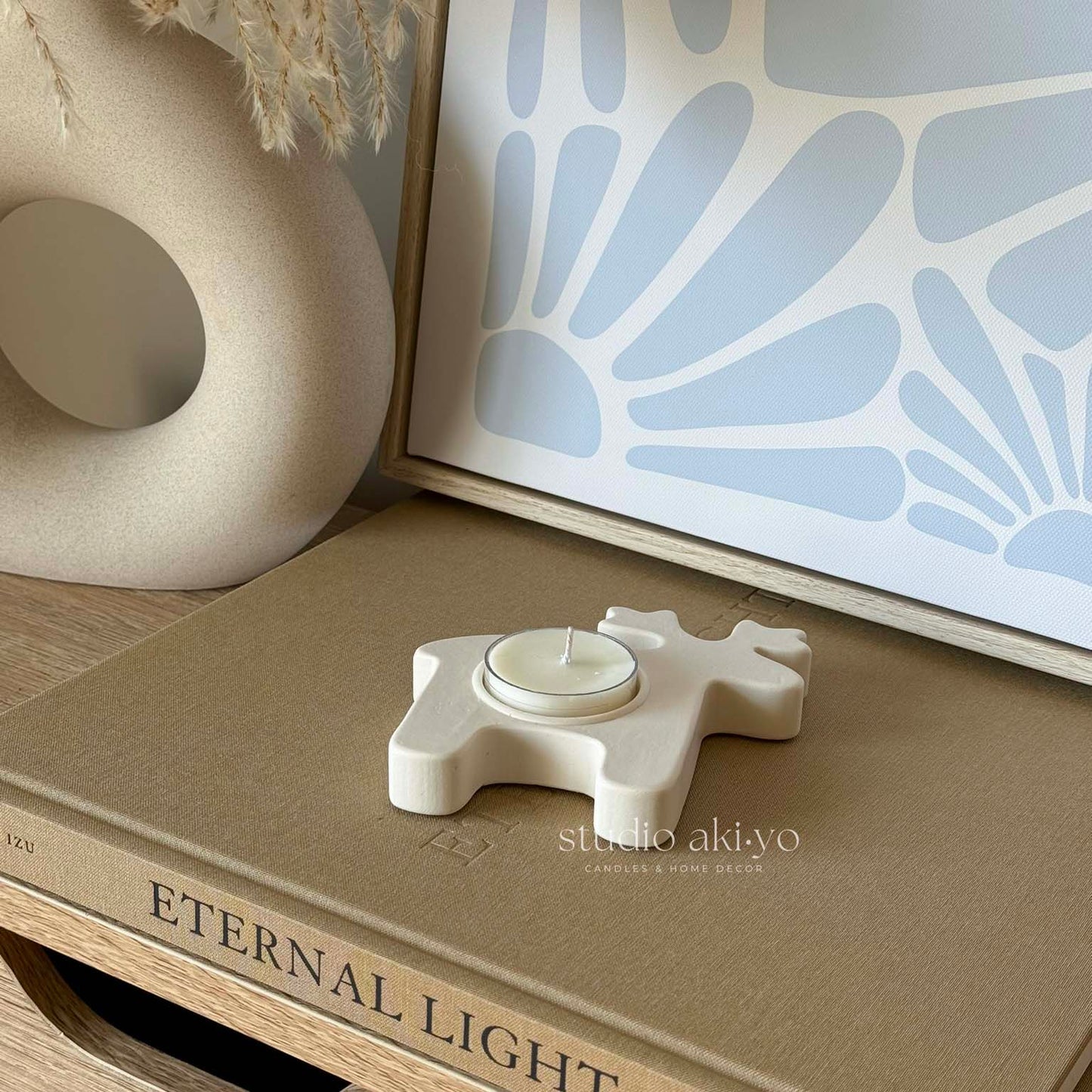 Cream white ceramic reindeer tealight candle holder with cork base
