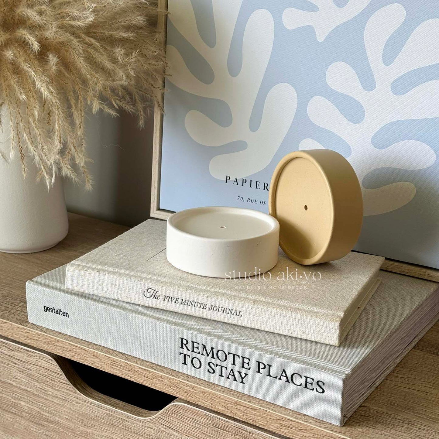 Round jesmonite incense stick holder on neutral aesthetic background