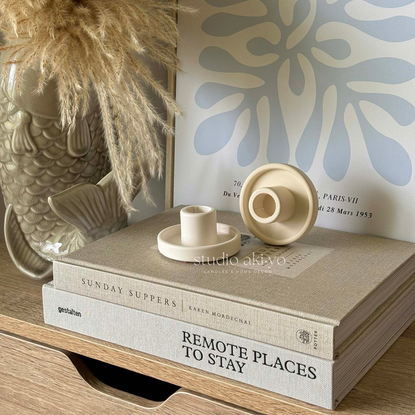 Neutral modern taper holder styled on a clean tabletop