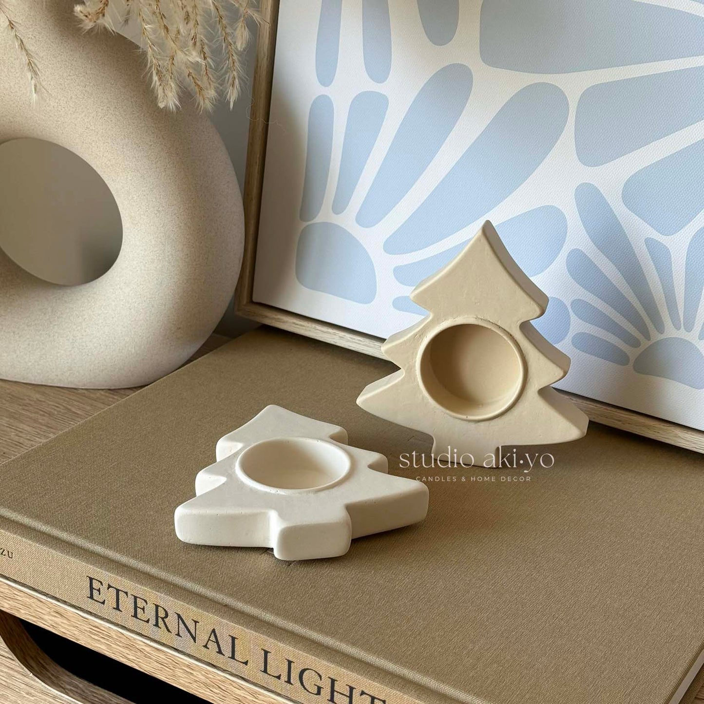 Neutral holiday candle holder styled on modern tablescape