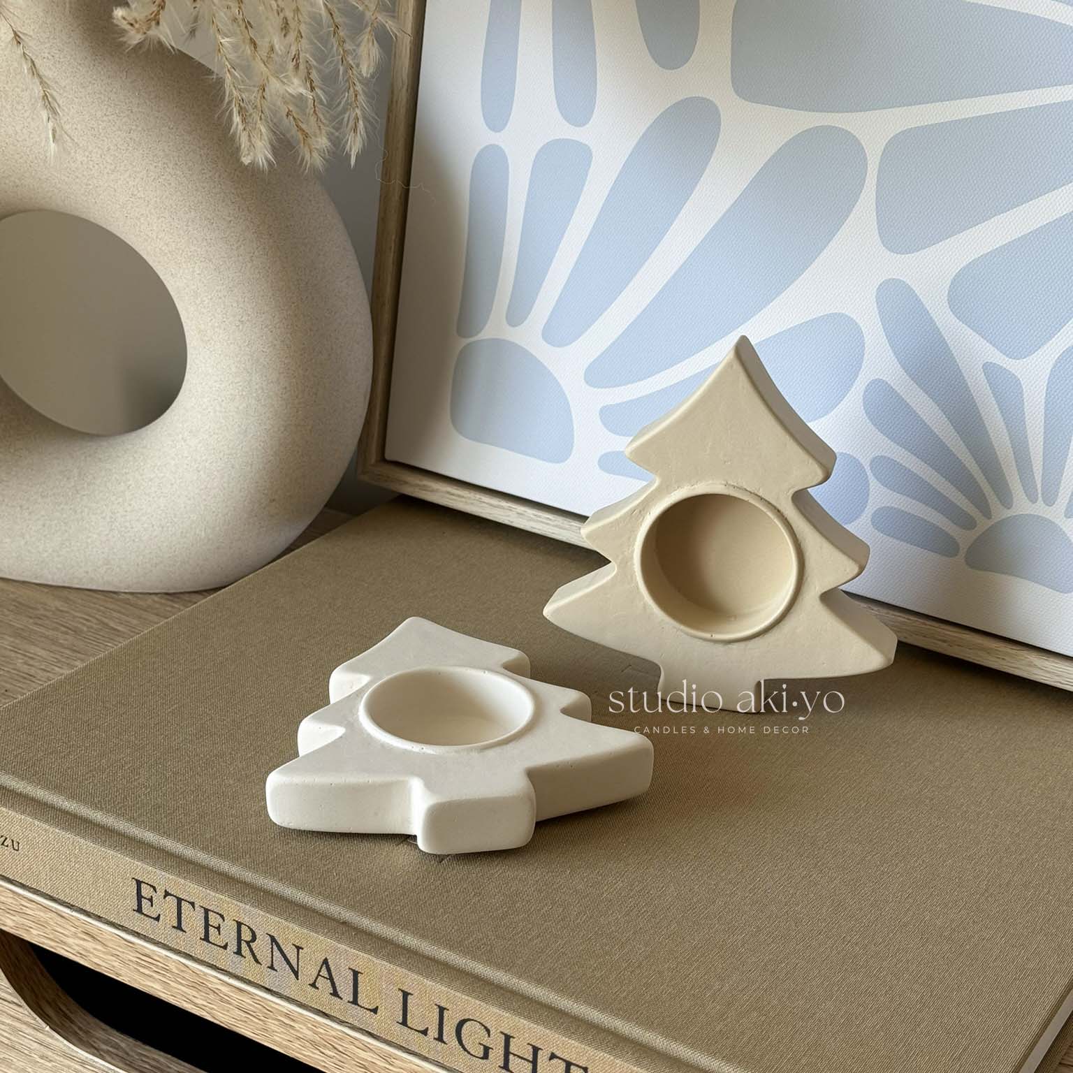 Neutral holiday candle holder styled on modern tablescape