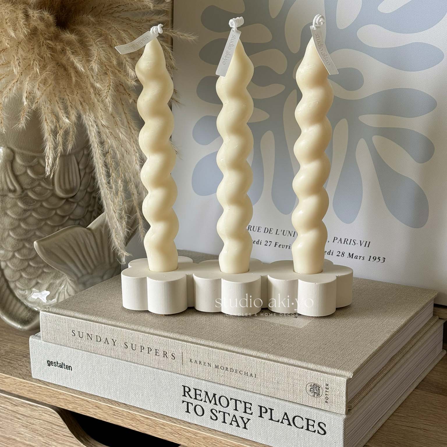 Jesmonite candle holder with three floral taper slots in neutral finish