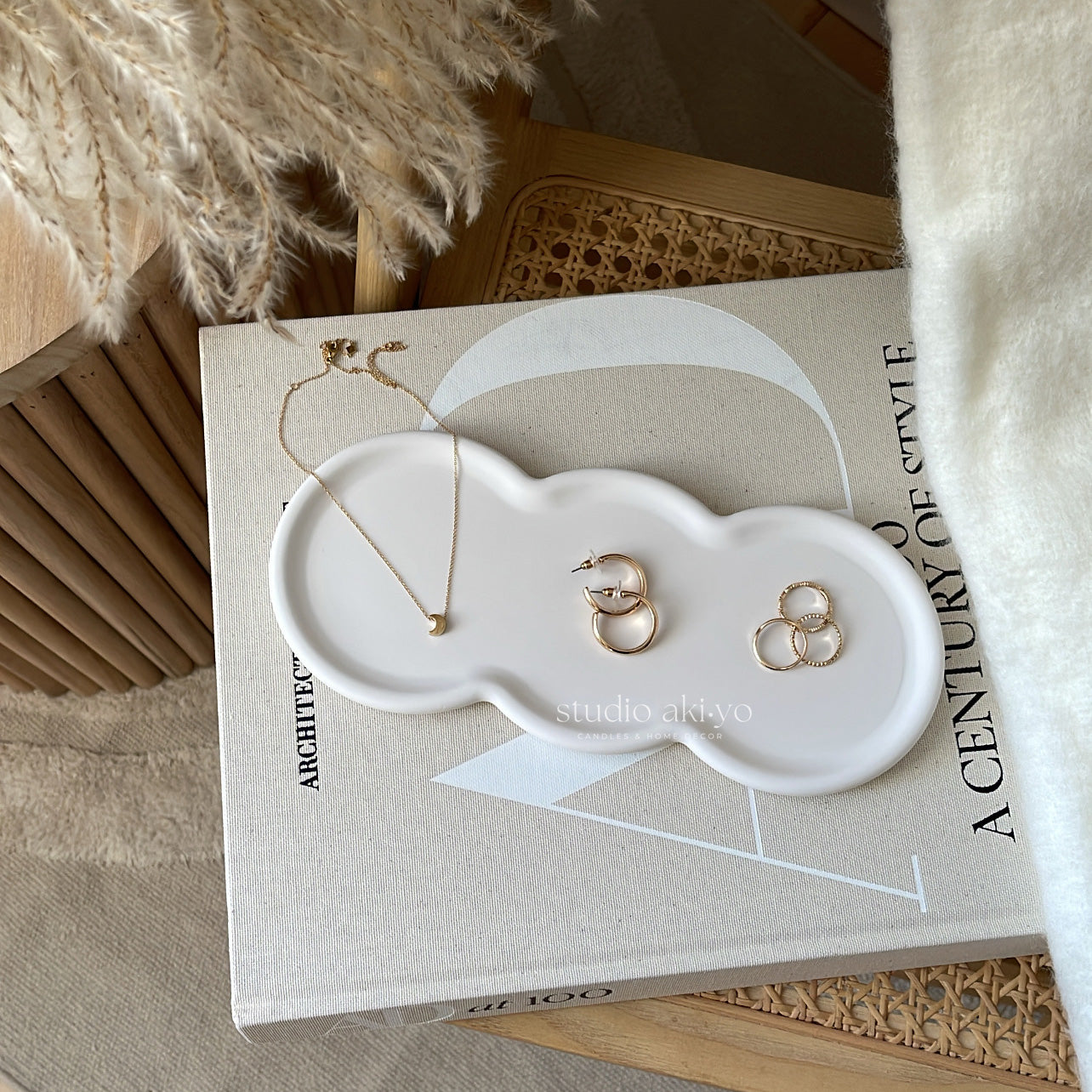 Jesmonite catchall tray holding keys and jewelry on neutral surface