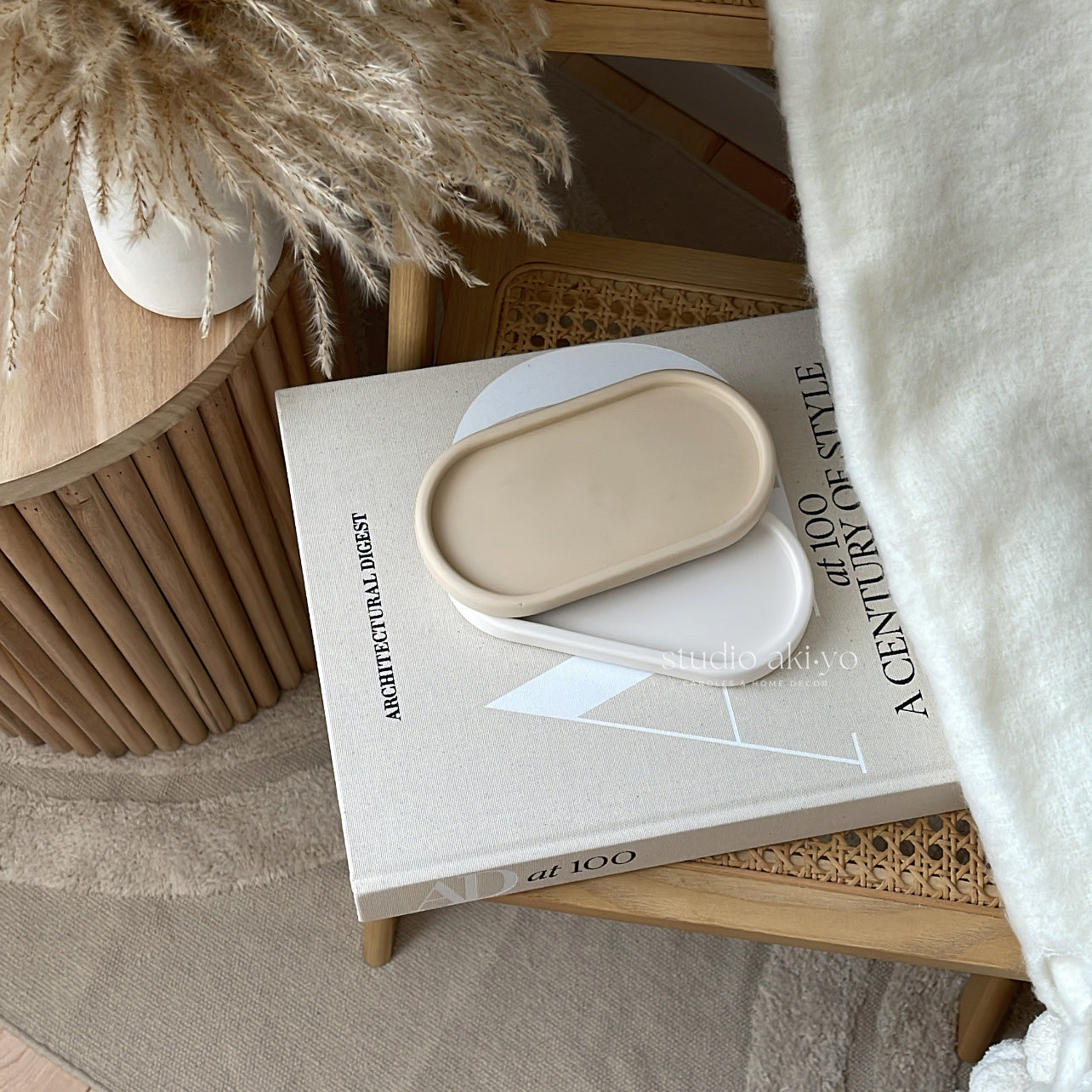 Handmade oval tray styled with jewelry and accessories