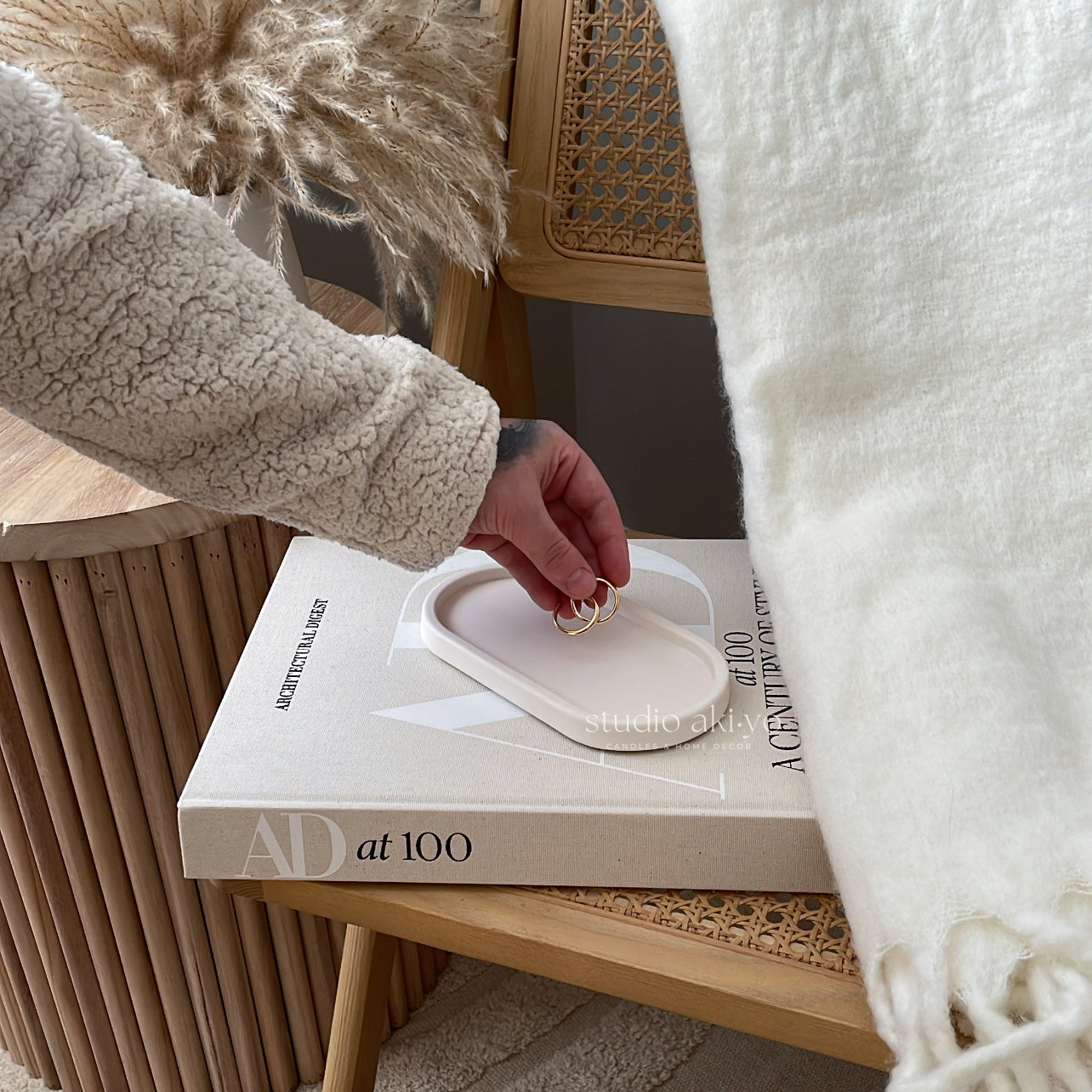 Handmade oval tray styled with jewelry and accessories