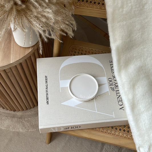 Round jesmonite trinket tray in soft neutral tone