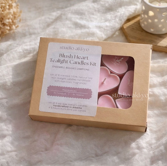 Blush heart tealight candles kit in a cardboard box on a soft fabric background