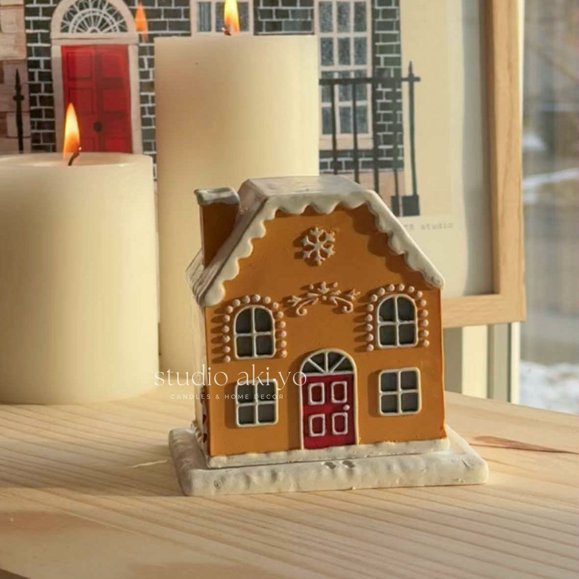 Candy Cane Gingerbread Incense Cone Holder on a shelf with books and a vase in the background