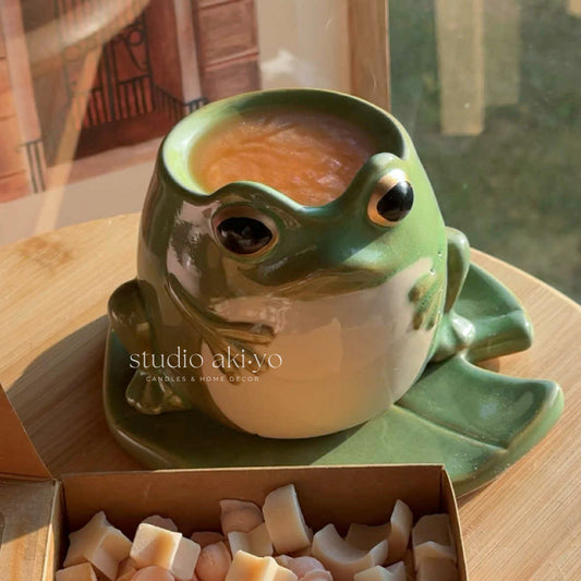 Ceramic frog wax melt burner on matching lily pad tealight warmer
