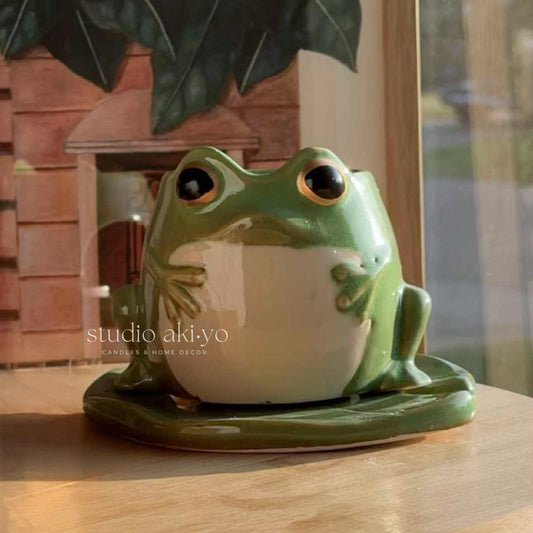 Ceramic frog wax melt burner on matching lily pad tealight warmer