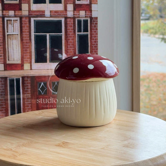 Mushroom cottagecore wax melt burner styled with botanical décor on wooden shelf