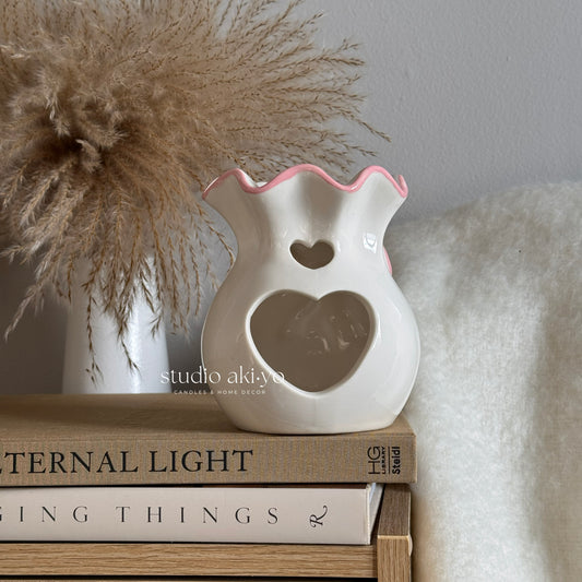 Pink bow valentine's day wax melt burner.