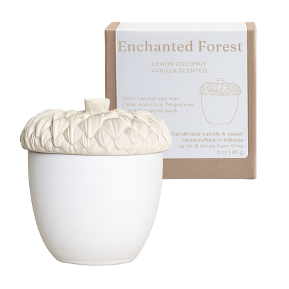 Studio Akiyo Enchanted forest wood wick candle scented with lemon coconut vanilla.