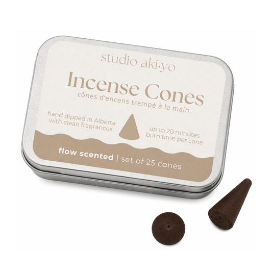 Flow incense cones in a tin with 'studio akiyo' branding on a white background