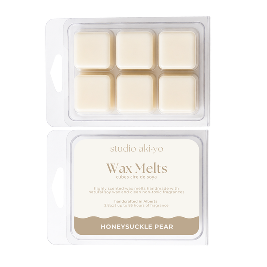 Studio Akiyo wax melts honeysuckle pear packaging with six melts and a label on a white background