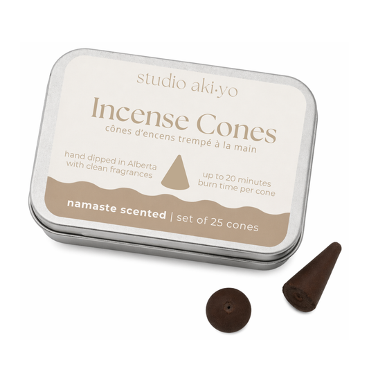 Namaste incense cones in a tin with 'studio akiyo' branding on a white background