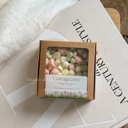 Cottagecore wax melts scoopies shaped with soft delicate flowers and scented with honeysuckle pear