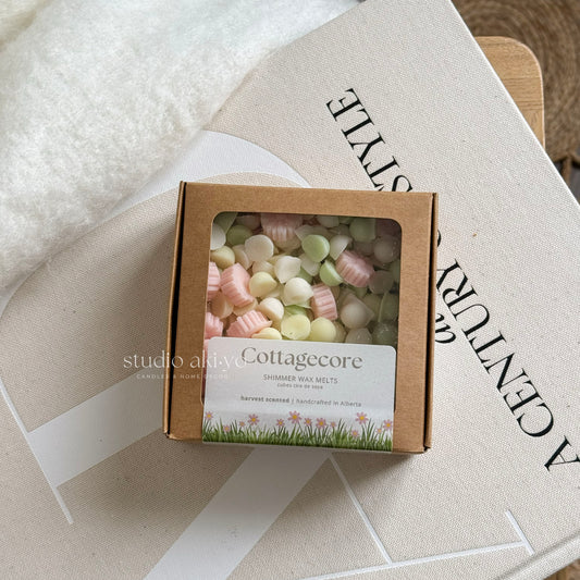 Cottagecore wax melts scoopies shaped with soft delicate flowers and scented with honeysuckle pear