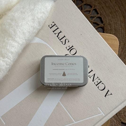 Metal tins with hand dipped incense cones  called Namaste