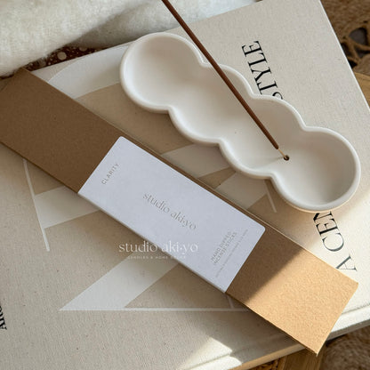 Incense stick holder with incense sticks Clarity from Studio Akiyo.