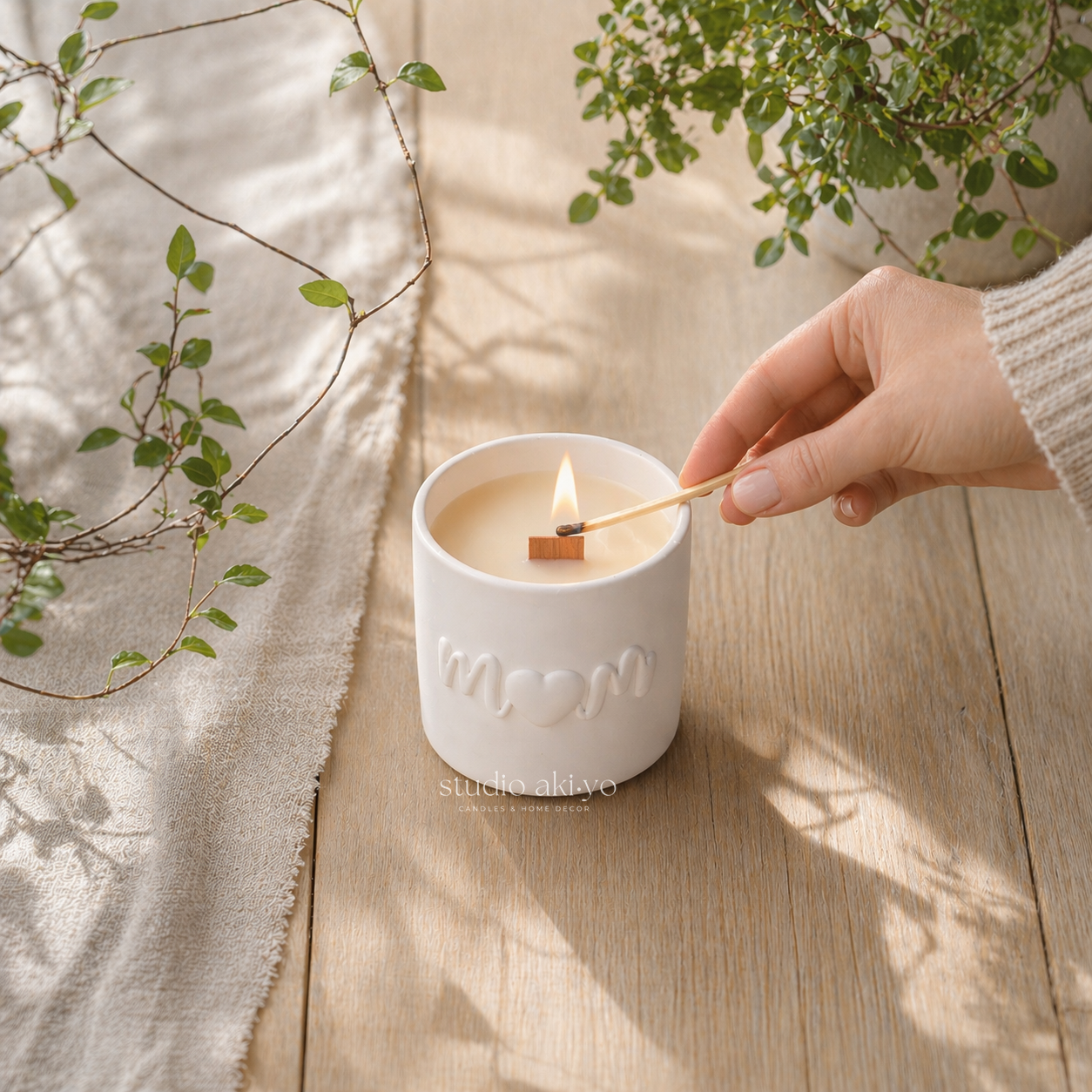 hand lighting studio akiyo's mom wooden wick candle handmade in Alberta, Canada.