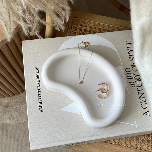 Neutral-toned jesmonite moon dish for jewelry or keys
