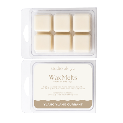 Studio Akiyo wax melts ylang ylang currant packaging with six melts and a label on a white background