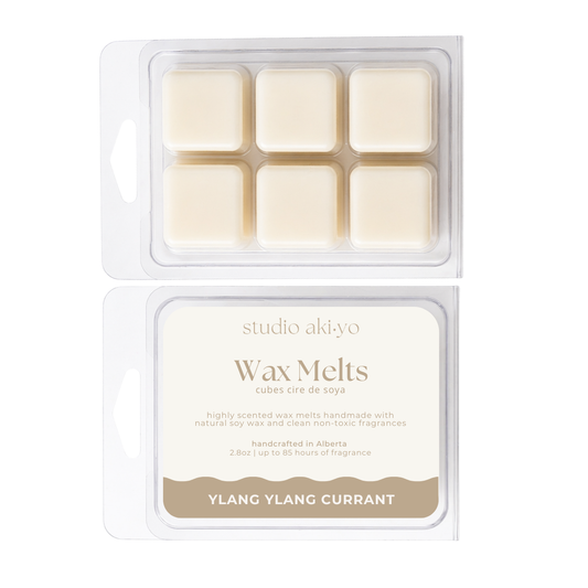 Studio Akiyo wax melts ylang ylang currant packaging with six melts and a label on a white background