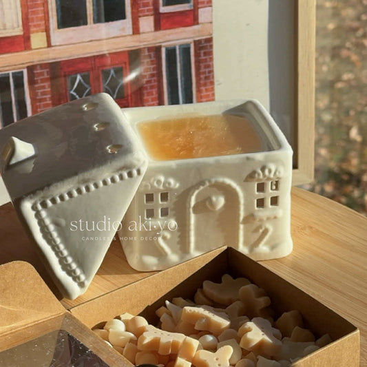 Ceramic gingerbread house wax melt burner with white icing detailing