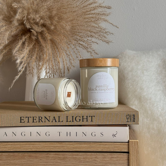 Studio Akiyo glass candle jar scented wood wick candle with natural bamboo lid.