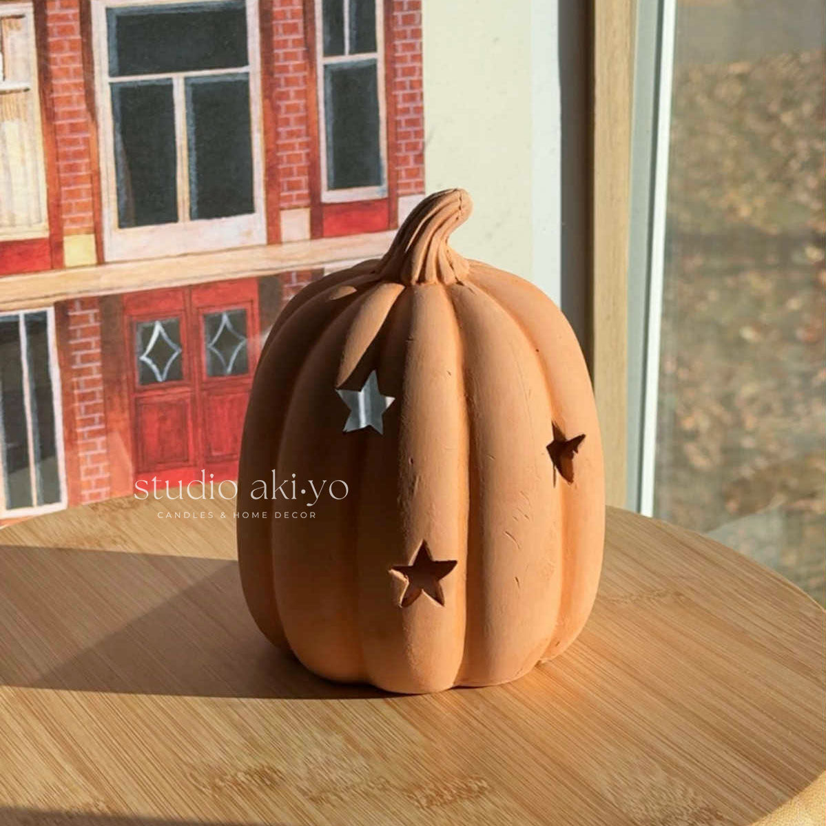 Terracotta Star Pumpkin Tealight Holder from the front